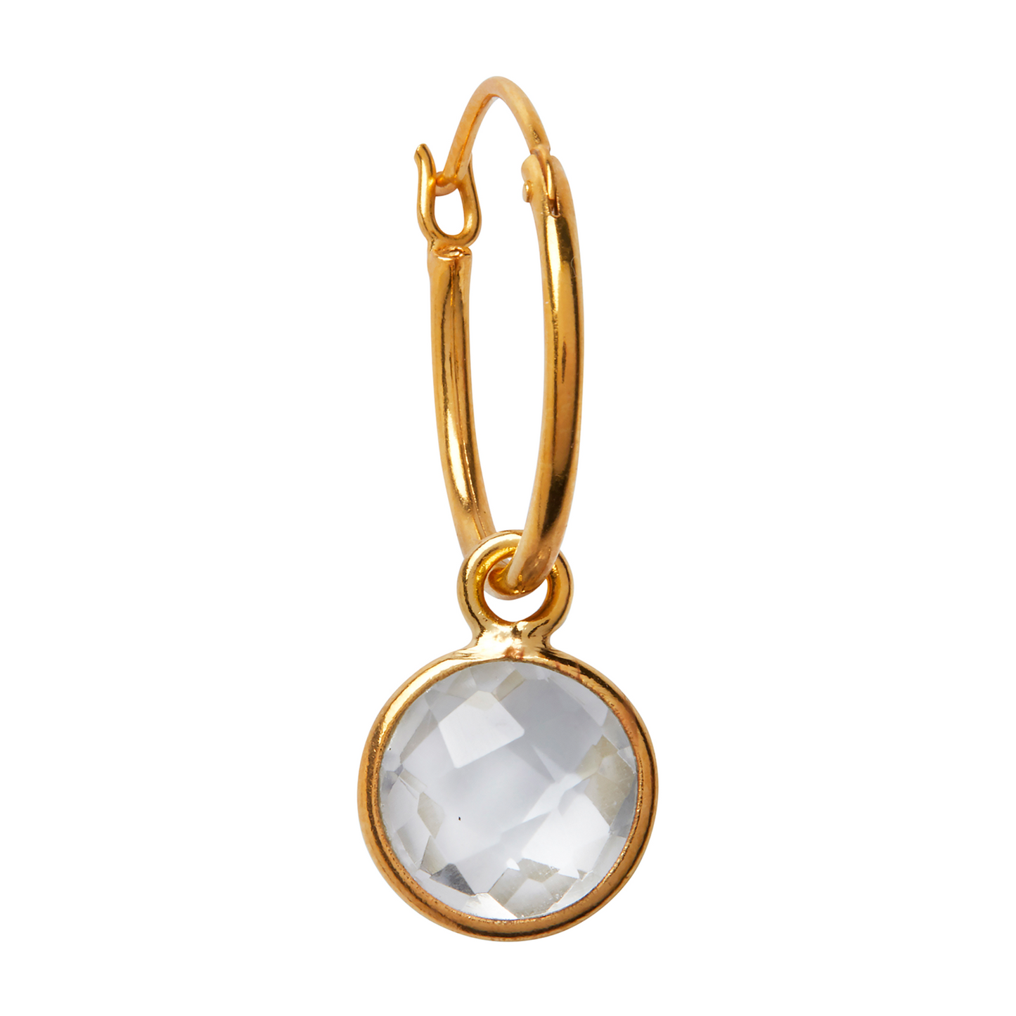 A round clear quartz crystal gemstone on a white background hanging from a Gold vermeil over sterling silver hoop earring.