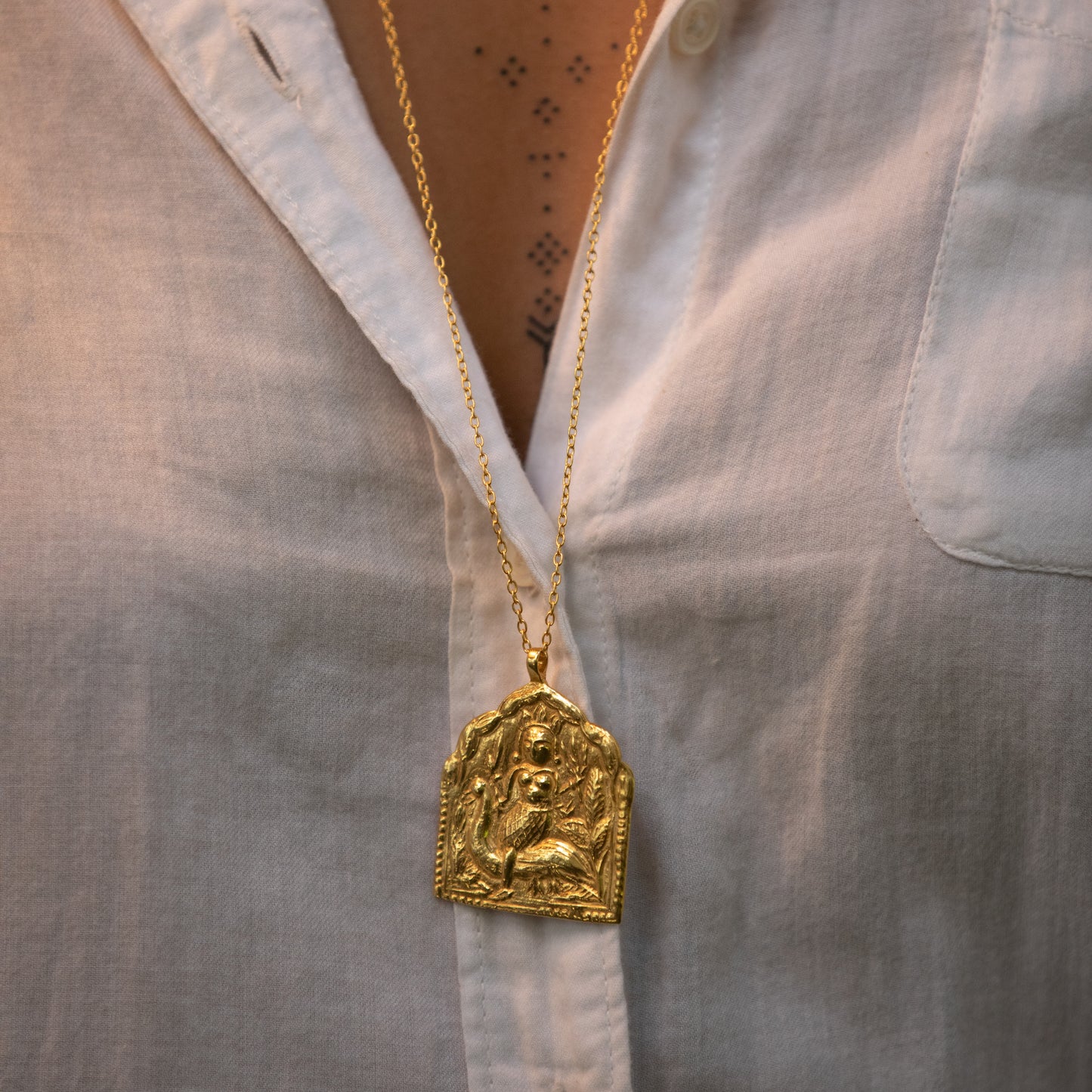 Handmade gold Saraswati Goddess of Creativity charm. Sacred spiritual jewelry pendant, Hindu deity for wisdom, art, music.